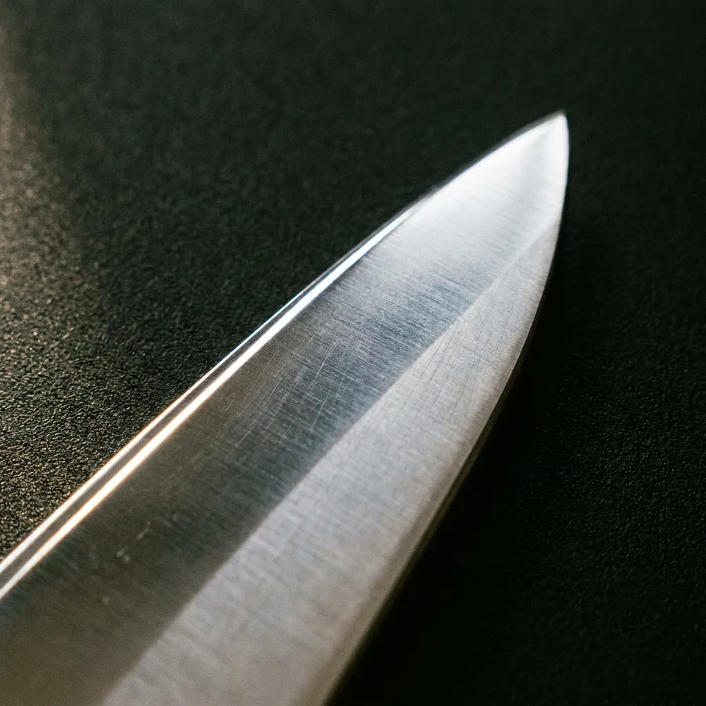 Macro photo of a freshly sharpened, polished knife bevel